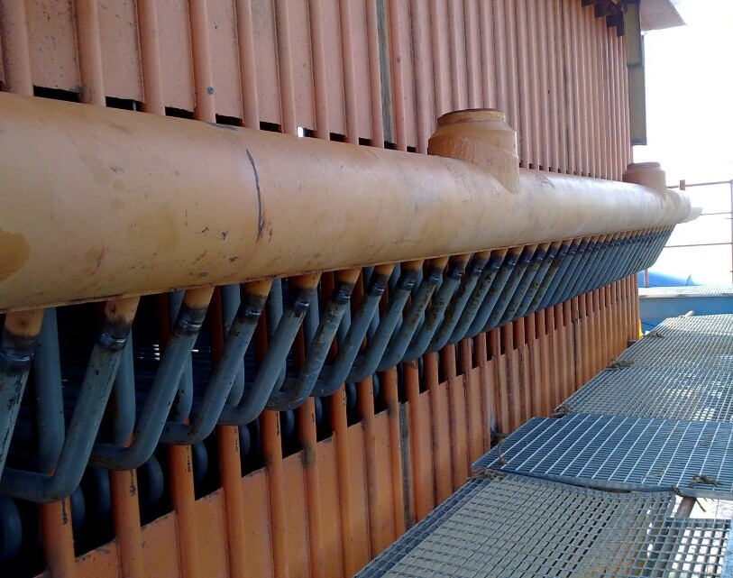 Real photograph of superheater piping installation, the application for the P91-904L laser weld patent
